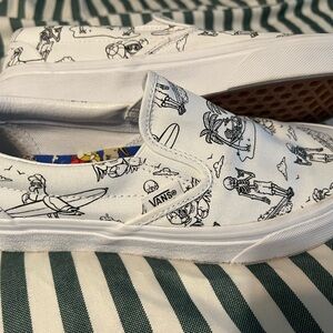 Vans White Slip-On Sneakers with Artistic Design